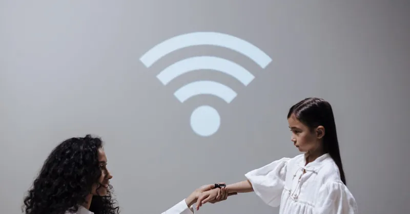 A mother and daughter holding hands with a Wi-Fi symbol, symbolizing modern connection.